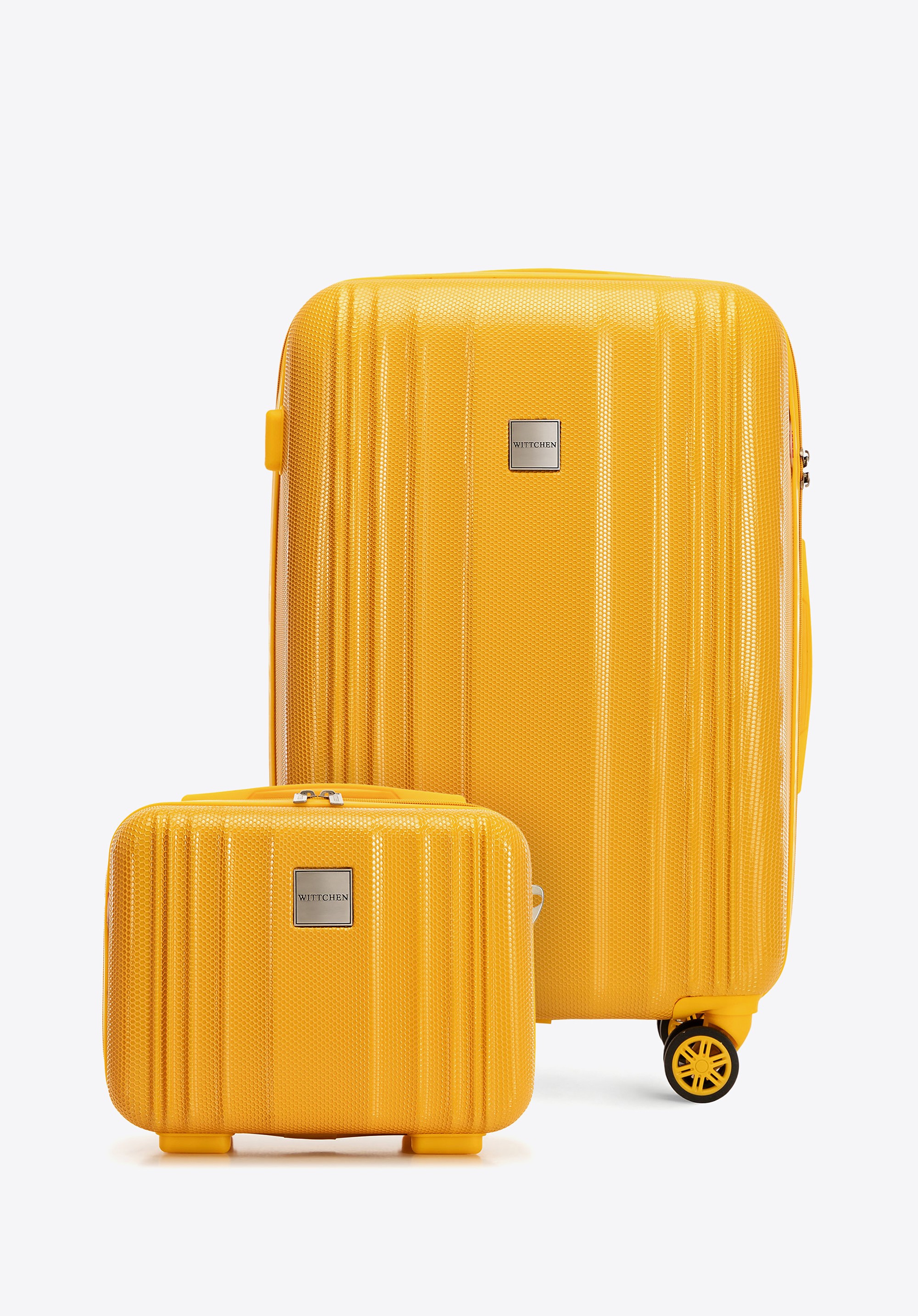 Średnia walizka i kosmetyczka z polikarbonu tłoczone żółte