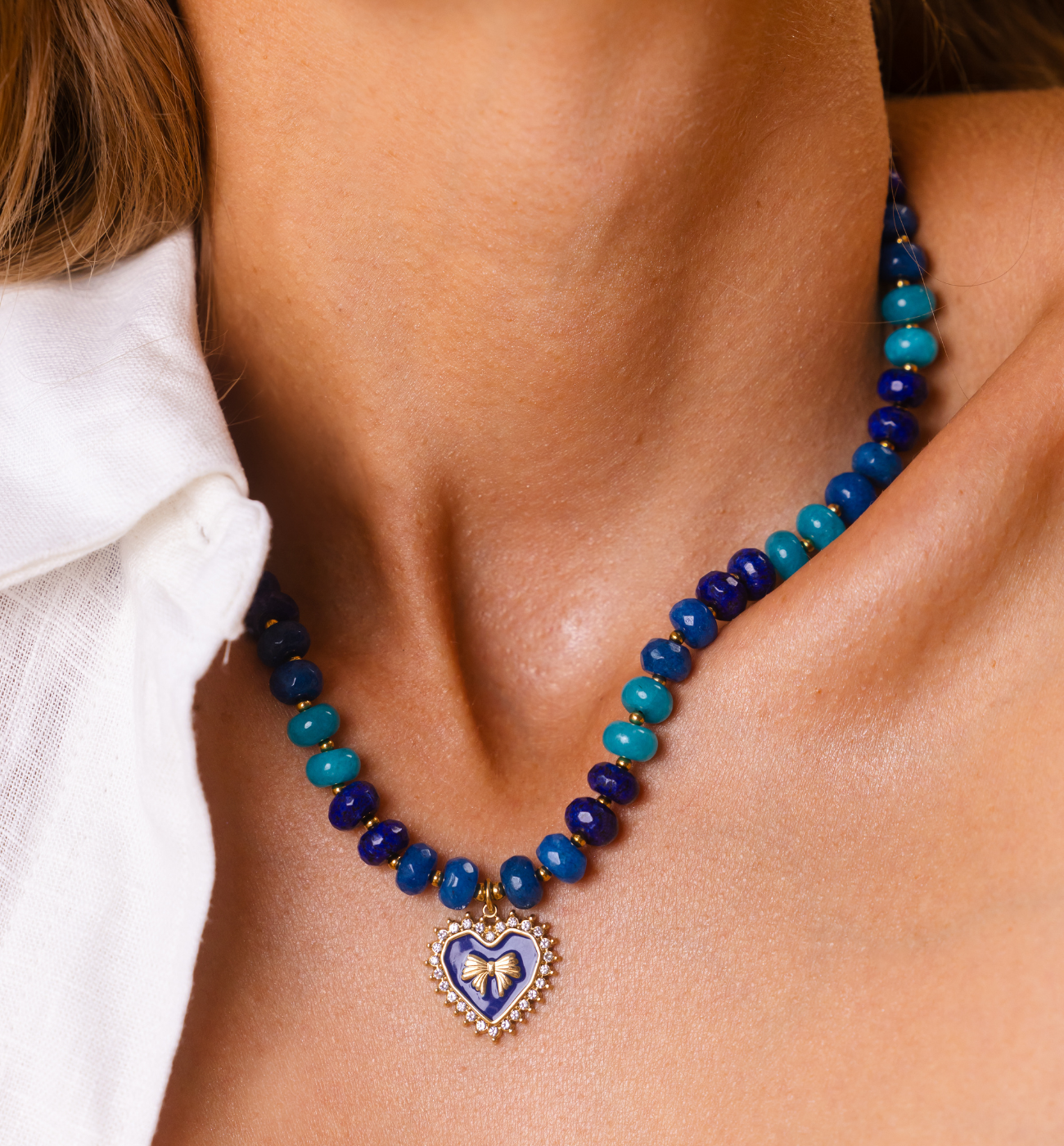 Naszyjnik granatowo-turkusowy z sercem i kokardką NPA1416