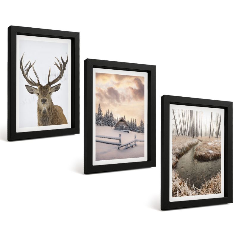 Trzyczęściowy Zestaw Obrazów ArtPrintCave 20x30 cm Czarna rama Zimowy krajobraz jeleń chatka 1 kpl.